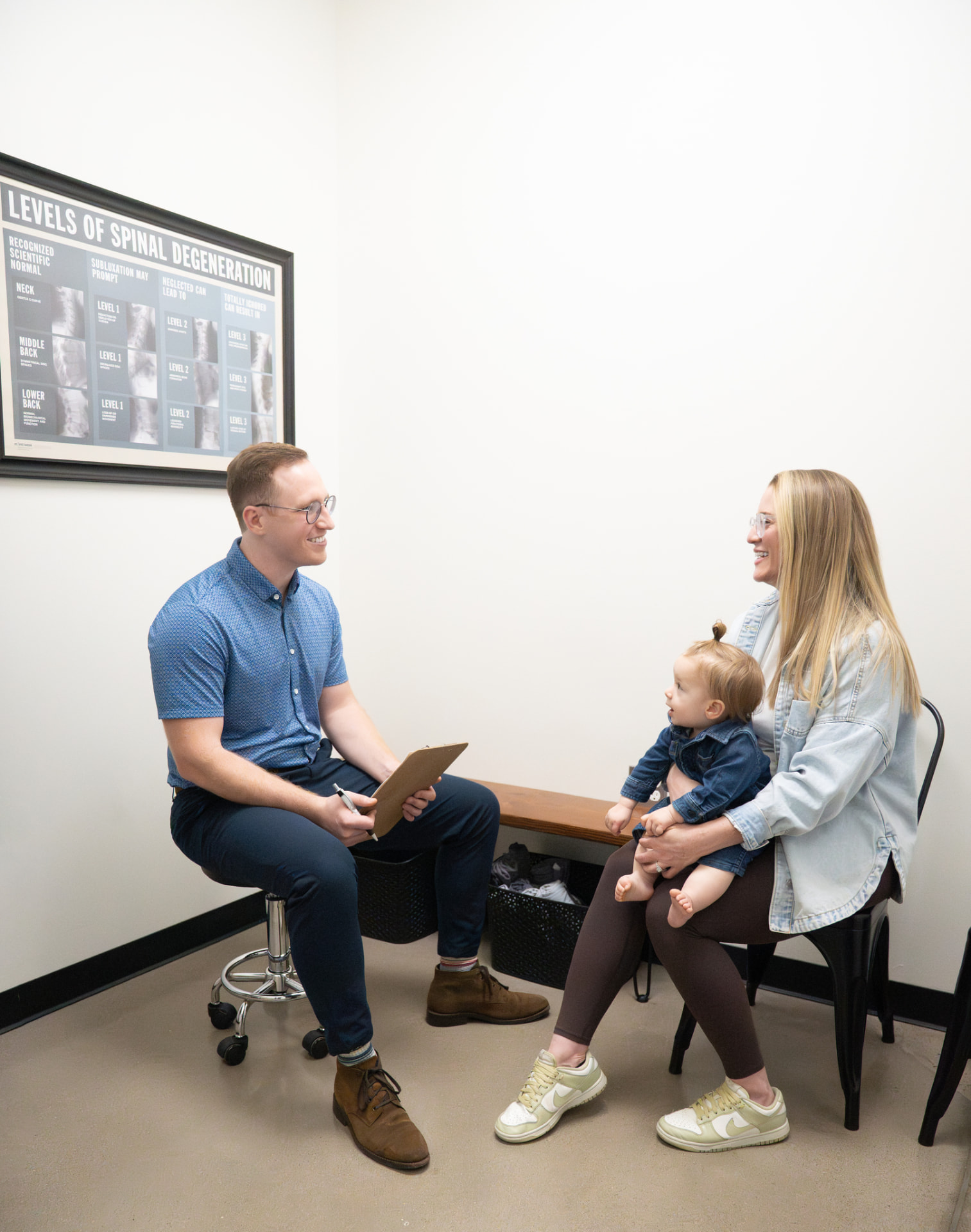 Dr. Blake consulting with a mother and child